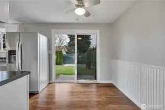 Good sized dining room with wainscoating & slider to back patio.