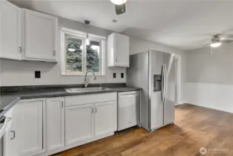 Another view of this good sized kitchen