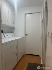 Utility hall with washer and dryer