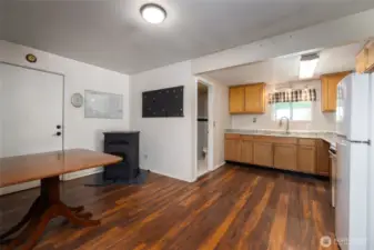 Dining room and kitchen of ADU w/pellet stove. (ADU not attached to home)