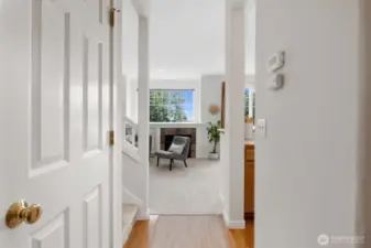 Abundant natural light and large windows create a bright, welcoming atmosphere throughout the main living space.