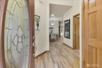Walk into 9 ft ceilings with newer flooring and 2,119 sq ft of living space