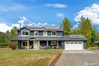 Home features 2528 sq ft, 5 bedrooms, 2.5 baths and solar panels for energy savings.