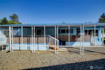 Covered porch and parking area.