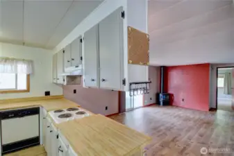 Peninsula looks into the family room. Check out the propane stove in the corner.