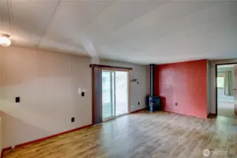 Family room has deck access through the sliding glass doors.