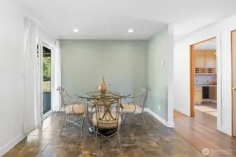 Dining room conveniently place near the kitchen and the outdoor deck.