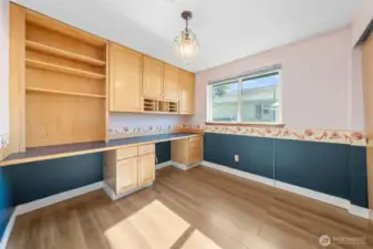 3rd Bedroom set up as office with huge window and built- in desk with drawers, bookshelf and cabinets. Great for working from home or just keeping yourself organized.
