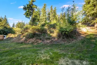 Lower level of property - fenced neighbor on left