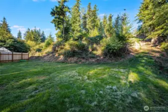 Lower level of property - fenced neighbor on left