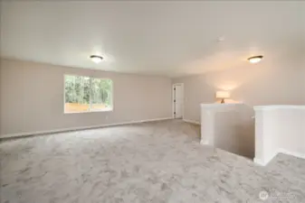 Main house: Upper level mezzanine with 4 bedrooms and a full bathroom.