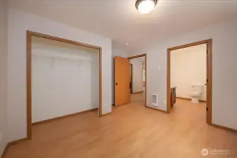 DADU: Primary bedroom with 3/4 ensuite bathroom.