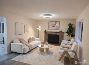 Bright and inviting living room featuring a real wood-burning fireplace that adds warmth and charm, modern lighting, and continuous waterproof laminate flooring throughout the home.