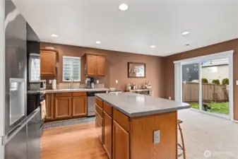 Large kitchen island offers seating, prep space, and storage—perfect for gathering and entertaining.