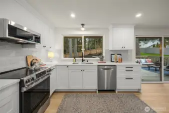 Kitchen overlooks the private back yard.
