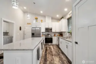 Utility Room through the door to the left. Garage straight ahead.