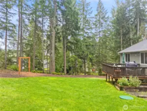 The wooden arch is made for a swing/s.