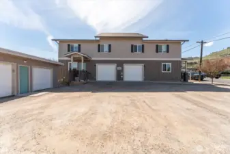 This is a mirror duplex with side-by-side units and an additional separate garage.