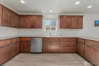 Lots of cabinets and space in the well designed kitchens.
