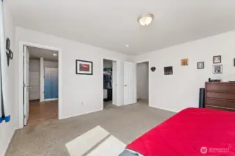 Primary bedroom looking towards the primary bathroom.