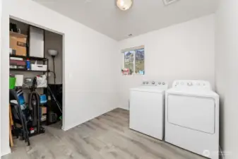 Laundry room upstairs. Washer & dryer in both units are included in sale. Large storage closet too.