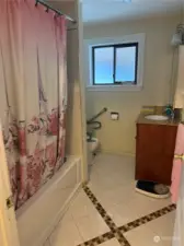 Full bathroom with full tuband shower