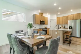 Photos shown are of a similar floor plan previously built in a different neighborhood (The Ridge in Blaine). Finishes and features may vary. Some items pictured reflect buyer-selected upgrades which are not included in the base price and may be added at an additional cost.