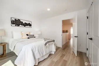 Photos shown are of a similar floor plan previously built in a different neighborhood (The Ridge in Blaine). Finishes and features may vary. Some items pictured reflect buyer-selected upgrades which are not included in the base price and may be added at an additional cost.