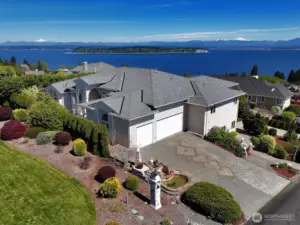 3 car garage with ample driveway parking