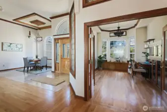 Large entrance with dining/sitting area and office space