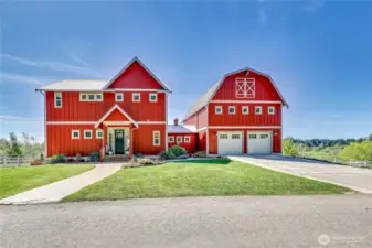 Welcome to 26039 Leyman Lane NE, an iconic Kingston landmark affectionately known as "The Big Red Barn."