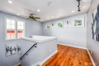 Flex space at the landing at the top of the stairs allows you to decide how to best use it. Music? Office space? Craft space? Room to exercise? You choose!