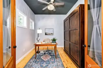 A den/office space with a Murphy bed, complete with brand new mattress, is off of the main entry.