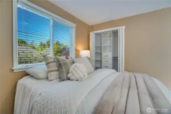 Closet with built-in hanging and drawer space
