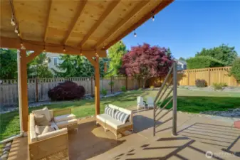 Stamped concrete back patio with cover. Enjoy your backyard throughout the year. Stamped concrete is aesthetically pleasing, easy to clean and maintain.
