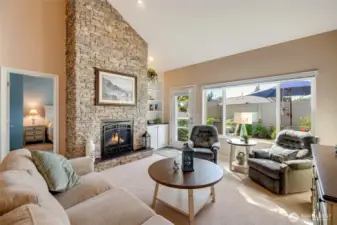 Centered around a warm gas fireplace, this space is perfect for movie nights, game days, or curling up with a book.