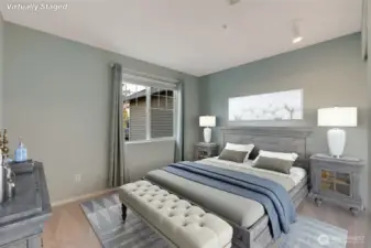 A second bedroom and full bath provide an ideal setup for guests or family, offering comfort and privacy away from the main-level suite. [Photo is virtually staged.]