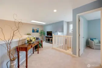 Upstairs, a versatile loft awaits.