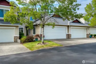 The attached two-car garage ensures secure parking and extra storage space for your needs.