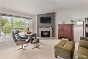 Light and bright, vaulted ceilings, wood burning fireplace currently has an electric insert that can be removed or stay.