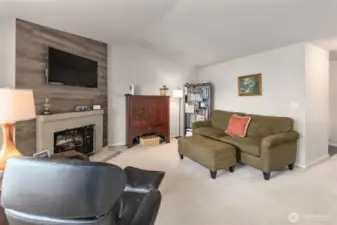 Light and bright, vaulted ceilings, wood burning fireplace currently has an electric insert that can be removed or stay.