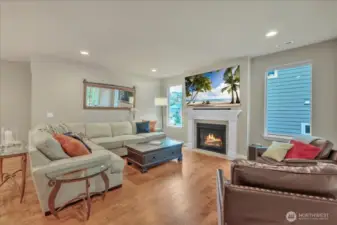 Generously sized living area with cozy gas fireplace.
