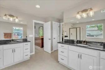 Two sinks with their own dedicated counter and drawer spaces!