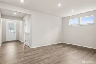 Another angle showing the Dining Space and Entryway.