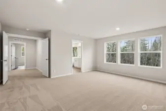 Primary Suite with En-Suite Bath, and French Door Entrance.