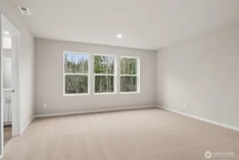 Primary Suite with Large Windows.
