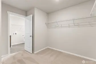 Primary Bedroom Walk in Closet.