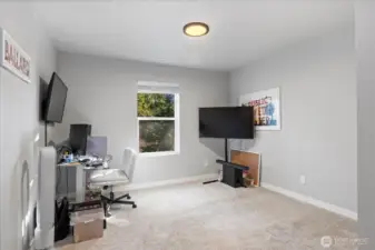 Lower level 3rd bedroom with greenbelt views & private en-suite!