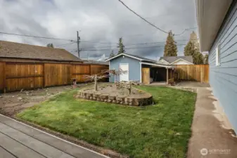 Shed, Japanese maples, and privacy fenced yard
