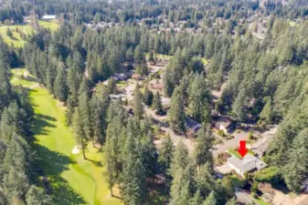 Aerial view of the house location to that of the golf course!  Drive your golf care from your new home to the clubhouse!!  Mill Creek Towncenter only minutes away with wonderful shopping, restaurants, and access to the freeway and hospitals close by!  Boeing is minutes away as well!!